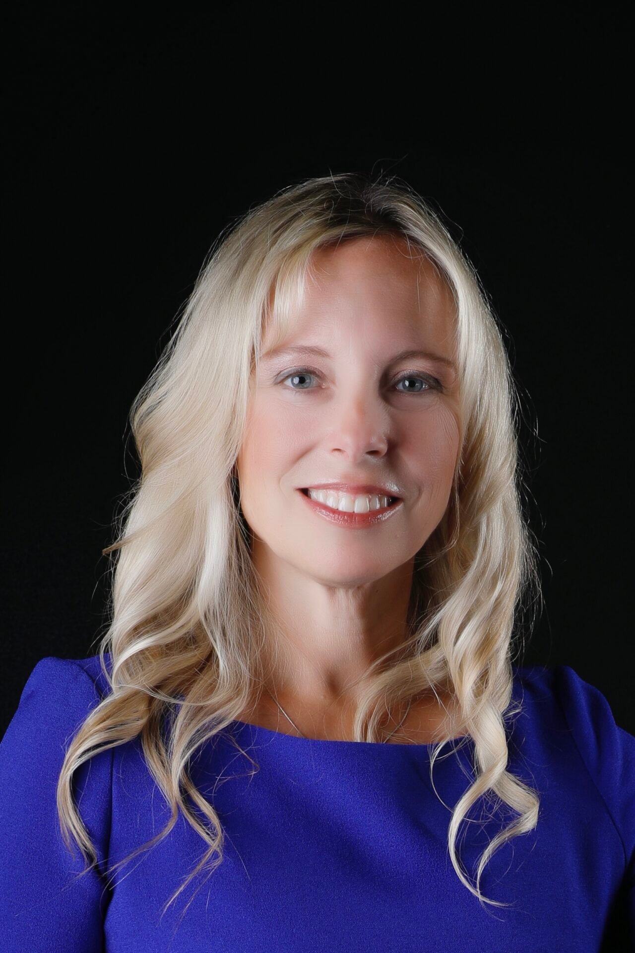 About Us 8 BoothHeadShot